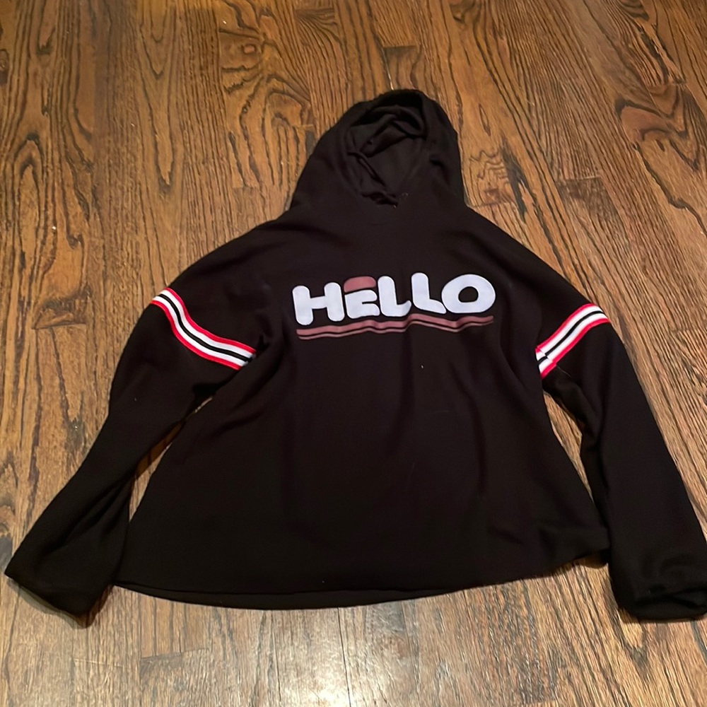 Girls revelation black top with hood.